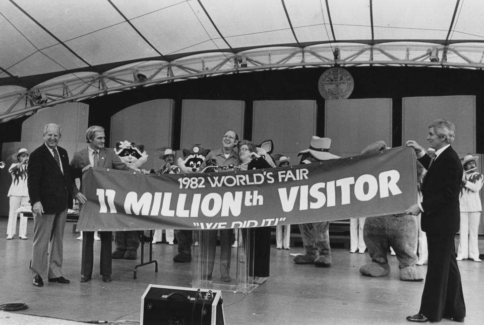 In an Oct. 30, 1982, photograph, Charles and Helen Hutchinson of Cincinnati, Ohio, are feted as the 11 millionth visitors to the World's Fair. Helping celebrate the occasion are World's Fair Commissioner General Dortch Oldham, left, Knoxville International Energy Exposition President S.H. "Bo" Roberts Jr., and World's Fair Board of Directors Chairman Jake Butcher. (News Sentinel Archive)