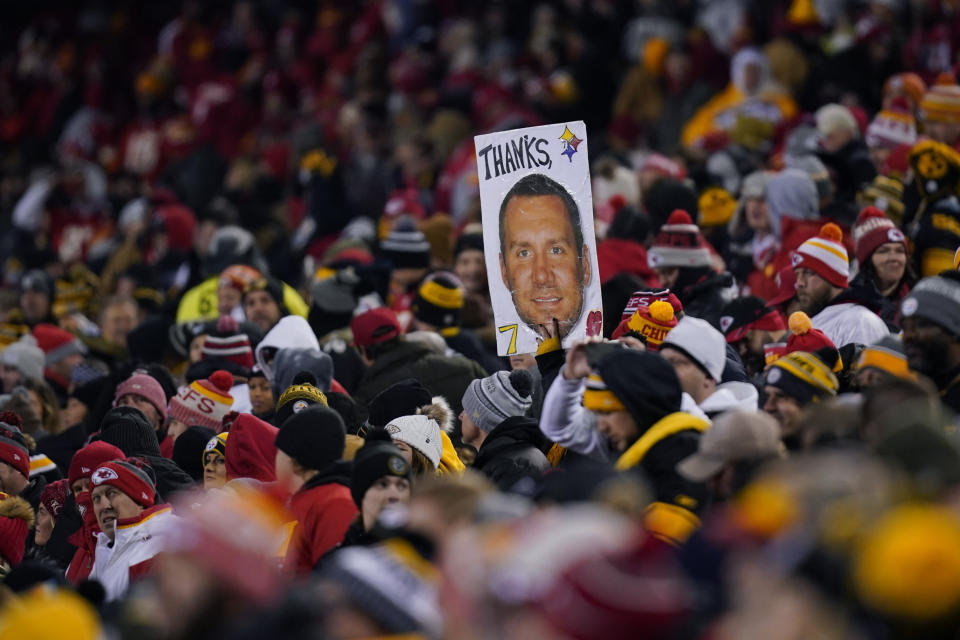 A fan holds a poster of Pittsburgh Steelers quarterback Ben Roethlisberger during the first half of an NFL wild-card playoff football game between the Kansas City Chiefs and the Pittsburgh Steelers, Sunday, Jan. 16, 2022, in Kansas City, Mo. (AP Photo/Ed Zurga)