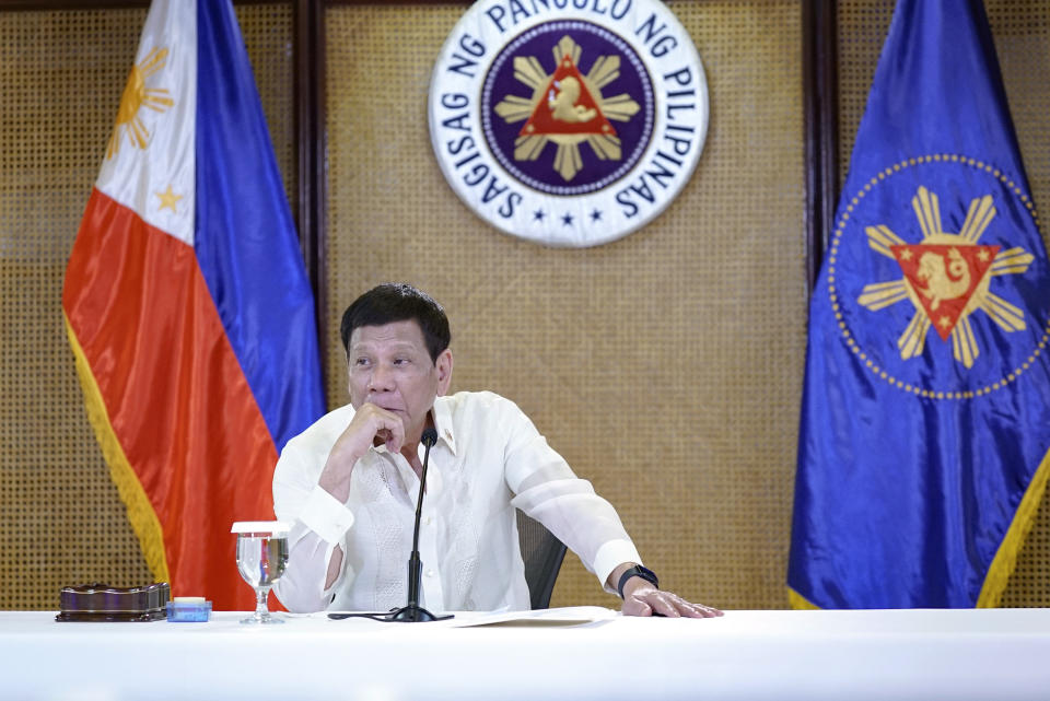 FILE - In this photo provided by the Malacanang Presidential Photographers Division, Philippine President Rodrigo Duterte listens during a meeting with government officials at the Malacanang presidential palace in Manila, Philippines on Monday May 23, 2022. International Criminal Court judges on Thursday, Jan. 26, 2023, cleared the way for the court's prosecution office to resume its investigation into the so-called war on drugs in the Philippines. Former Philippine President Rodrigo Duterte has defended the crackdown as “lawfully directed against drug lords and pushers who have for many years destroyed the present generation, especially the youth.” (King Rodriguez/ Malacanang Presidential Photographers Division via AP, File)