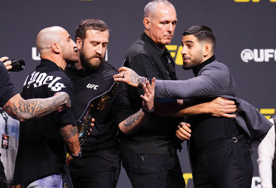 LAS VEGAS, NEVADA - DECEMBER 15: (L-R) Opponents Alexander Volkanovski and Ilia Topuria face off during the UFC 2024 seasonal press conference at MGM Grand Garden Arena on December 15, 2023 in Las Vegas, Nevada. (Photo by Chris Unger/Zuffa LLC via Getty Images)