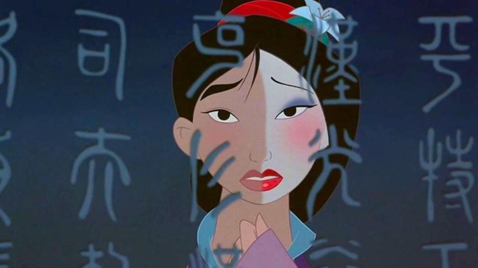 Mulan with half a face of makeup