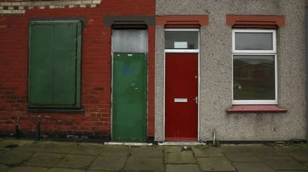 A house with a painted red door is seen on a terraced street in the Gresham area of Middlesbrough, northern Britain, January 20, 2016. REUTERS/Phil Noble