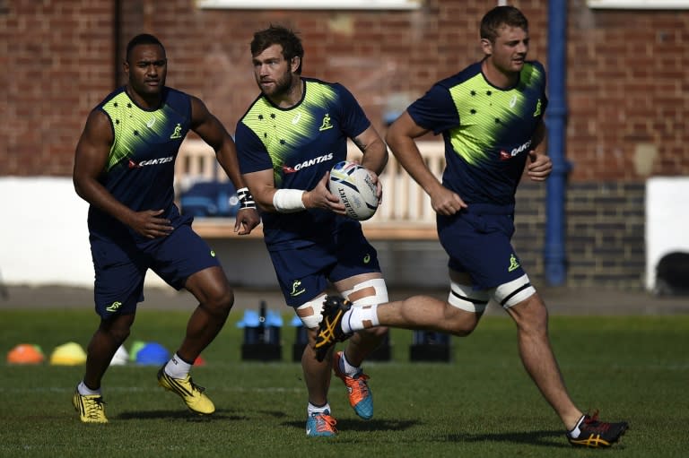 (From L) Australia's Tevita Kuridrani, Ben McCalman and Dean Mumm attend a team training session at Dulwich college in south London, on October 8, 2015, during the Rugby World Cup