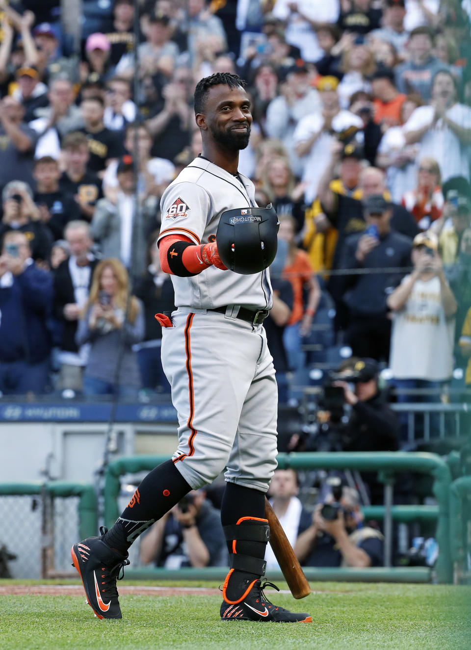 San Francisco Giants’ Andrew McCutchen acknowledges fans during a tribute to his years with the Pittsburgh Pirates on Friday in Pittsburgh. (AP Photo/Gene J. Puskar)