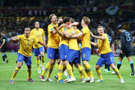 KIEV, UKRAINE - JUNE 15: Sweden celebrate after Olof Mellberg of Sweden scored their first goal during the UEFA EURO 2012 group D match between Sweden and England at The Olympic Stadium on June 15, 2012 in Kiev, Ukraine. (Photo by Scott Heavey/Getty Images)