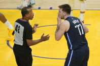 Dallas Mavericks guard Luka Doncic (77) reacts toward referee Eric Lewis after being called for a foul against the Golden State Warriors during the first half of Game 2 of the NBA basketball playoffs Western Conference finals in San Francisco, Friday, May 20, 2022. (AP Photo/Jeff Chiu)