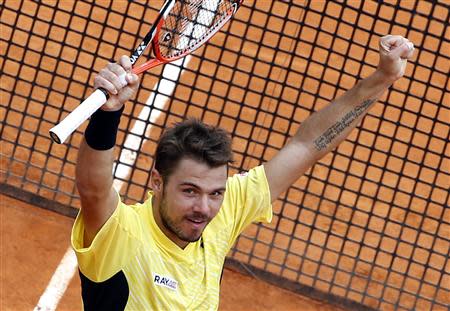 Stanislas Wawrinka of Switzerland celebrates after defeating David Ferrer of Spain during their semi-final match at the Monte Carlo Masters in Monaco April 19, 2014. REUTERS/Eric Gaillard