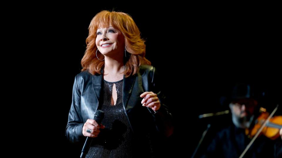 PHOTO: Reba McEntire performs onstage during Not That Fancy: An Evening With Reba & Friends at Ryman Auditorium on November 05, 2023 in Nashville, Tennessee. (Jason Kempin/Getty Images)