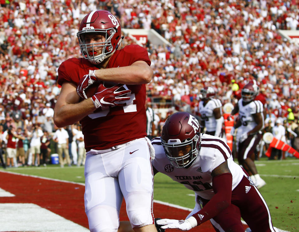 Alabama tight end Hale Hentges (84) catches a touchdown pass over Texas A&M defensive back Larry Pryor (11) during the first half of an NCAA college football game, Saturday, Sept. 22, 2018, in Tuscaloosa, Ala. (AP Photo/Butch Dill)