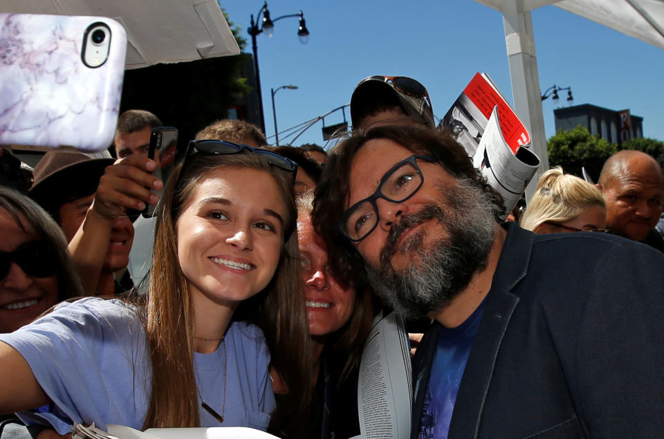 Jack Black posed for selfies. (Photo: Mario Anzuoni / Reuters)