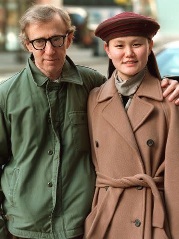 <p>Lawrence Schwartzwald/Sygma/Getty</p> Woody Allen and Soon-Yi Previn in February 1997