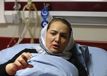 Afghan member of parliament Shukria Barakzai, speaks during an interview at a hospital after having survived an attack on November, in Kabul December 27, 2014. REUTERS/Mohammad Ismail