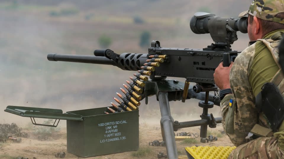 A Ukrainian soldier practices with an American-donated machine gun at a training ground in eastern Ukraine. - Vasco Cotovio/CNN