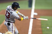 Atlanta Braves' Ronald Acuna Jr. hits a single against the Miami Marlins during the fourth inning of a baseball game Friday, May 20, 2022, in Miami. (AP Photo/Lynne Sladky)