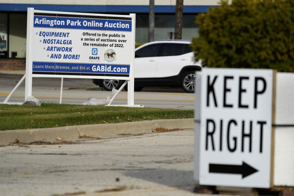 Information signs stand near the shuttered Arlington International Racecourse in Arlington Heights, Ill., Friday, Oct. 14, 2022. The Chicago Bears plan to pay for a new stadium at the site, but want taxpayer dollars to cover infrastructure costs such as roads and sewers to develop the site. (AP Photo/Nam Y. Huh)