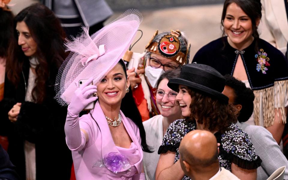 Katy Perry takes selfies with guests after the Coronation - Reuters