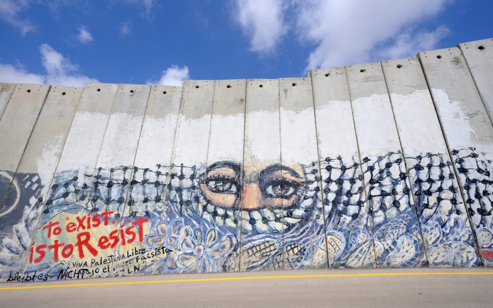 A mural on the Israeli West Bank barrier - Getty