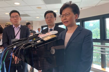 Hong Kong Chief Executive Carrie Lam and Secretary for Security John Lee Ka-chiu speak to media over an extradition bill protest in Hong Kong