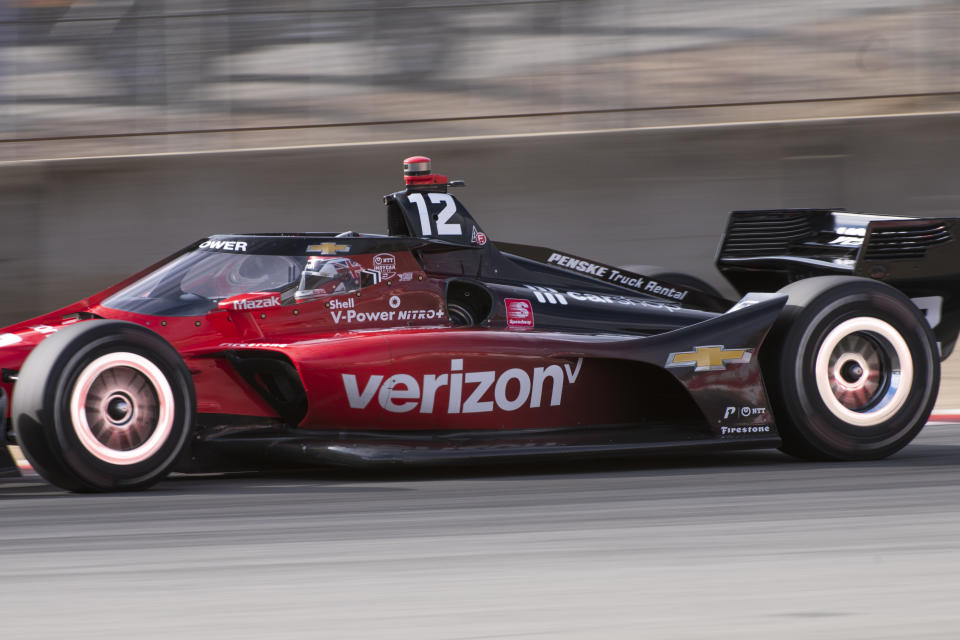 Team Penske driver Will Power (12), of Australia, speeds out of turn 3 during morning warmup for the IndyCar season finale auto race at Laguna Seca Raceway on Sunday, Sept. 11, 2022, Monterey, Calif. (AP Photo/Nic Coury)