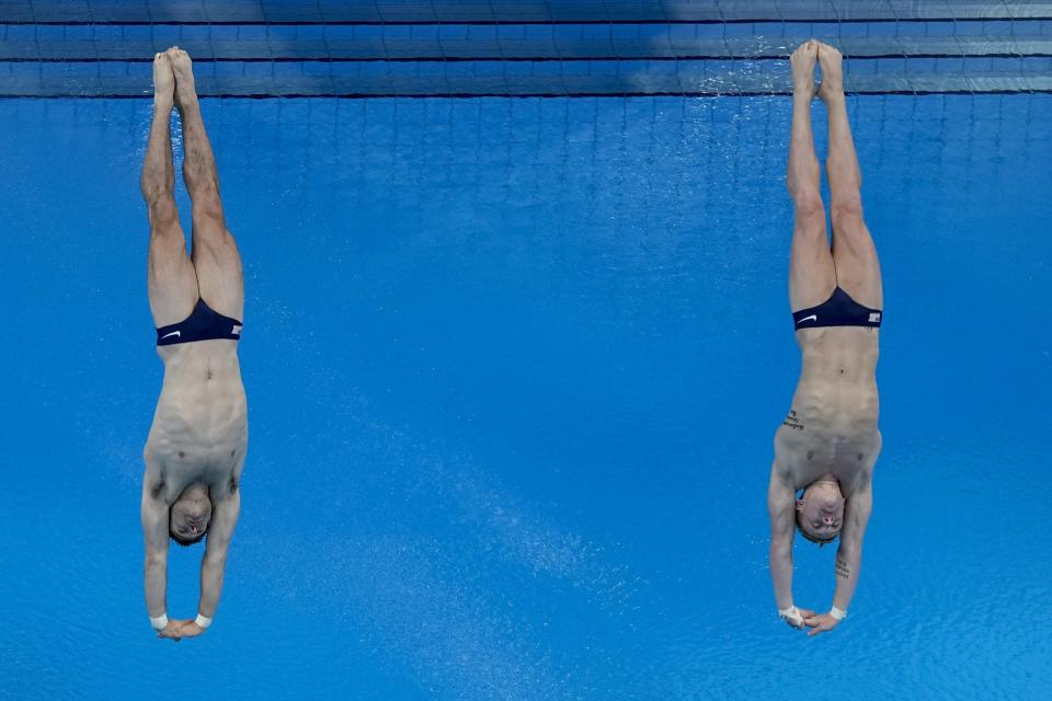 United States' Andrew Capobianco and Michael Hixon compete during men's synchronised 3-meter springboard at the 2020 Summer Olympics, Monday, July 26, 2021, in Tokyo, Japan. (AP Photo/Morry Gash)