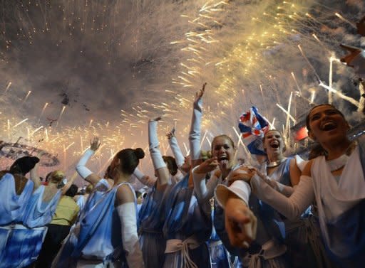 Performers celebrate at the end of the closing ceremony of the 2012 Olympic Games at the Olympic stadium in London, on August 12. Australian media lavishly praised the London Olympics on Monday, saying it came close to Sydney, as sports chiefs Down Under began dissecting what went wrong after the country's below-par medal haul