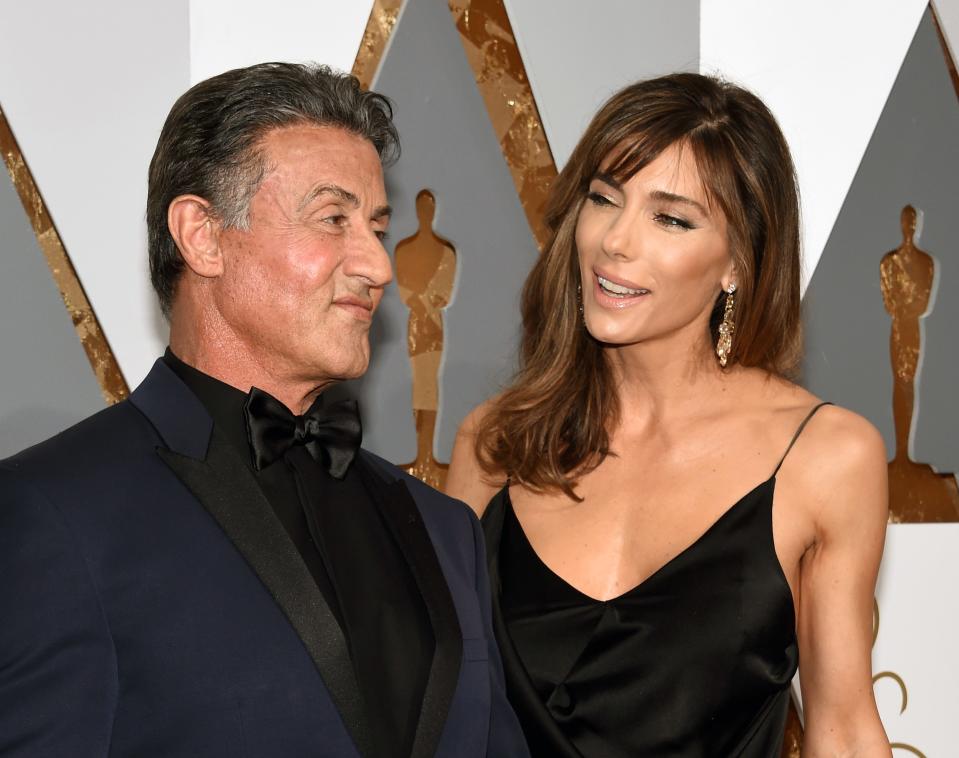 Actor Sylvester Stallone (L) and model Jennifer Flavin attend the 88th Annual Academy Awards on February 28, 2016 in Hollywood, California.
