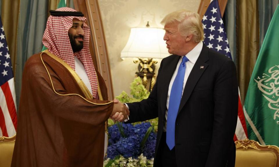 Donald Trump shakes hands with Mohammed bin Salman during the 2017 Riyadh summit, at which a $110bn defence deal was agreed.