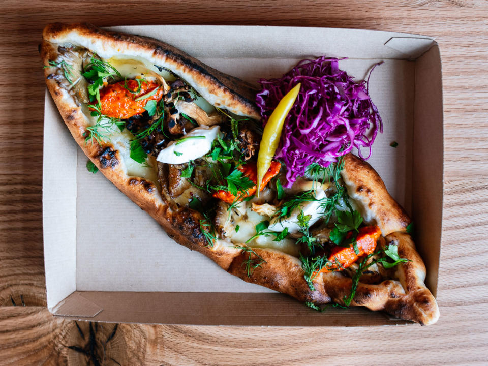Balkan Treat Box debuts a 1,825-square-foot space in Webster Groves, a suburb outside of St. Louis, with wood-fired flatbreads, grilled beef sausages, and a Bosnian-inspired cheeseburger.