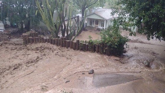 After a mudslide swamped the Shimbo family's home in Silverado, Calif., on Dec. 14, 2021, their insurance claim was denied. They are exploring bankruptcy and selling their house to the federal government.