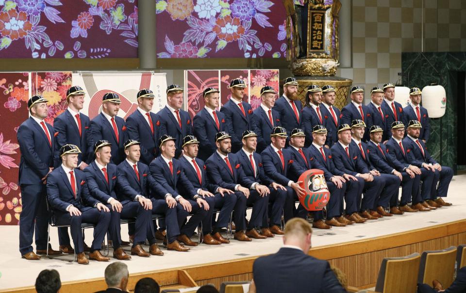 Wales' players pose for a group photo during the welcome ceremony in Kitakyushu, western Japan, Monday, Sept. 16, 2019, ahead of the Rugby World Cup in Japan. (Kyodo News via AP)