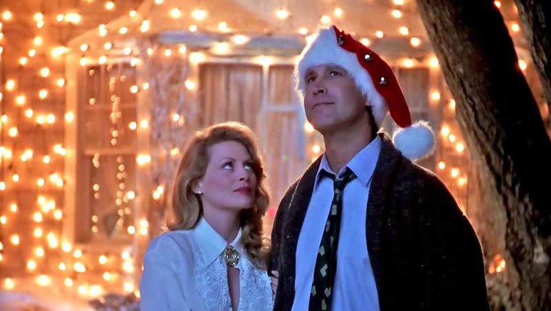 Beverly D’Angelo and Chevy Chase admire his handiwork with holiday lights in “National Lampoon’s Christmas Vacation.”