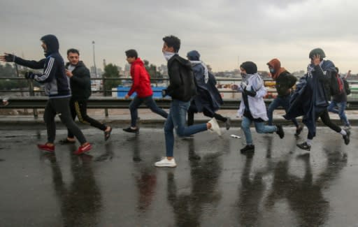 Iraqi protesters during ongoing demonstrations on Mohammad al-Qasim highway in east Baghdad on Wednesday