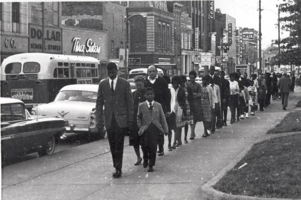 Henry W. Jones walked at the front of civil rights demonstrators marching down Main St in Lexington, KY in this undated photo. Photos of the civil rights movement in Lexington, KY in the 1960s. Photo Courtesy Calvert McCann