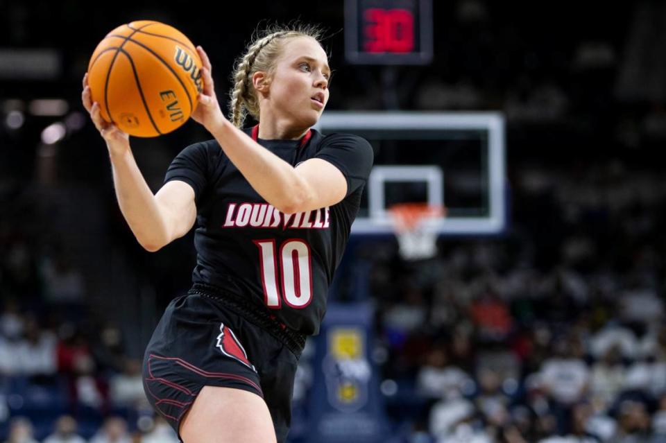 Louisville’s Hailey Van Lith (10) looks to pass during an NCAA college basketball game against Notre Dame on Sunday, Feb. 27, 2022, in South Bend, Ind. (AP Photo/Robert Franklin)