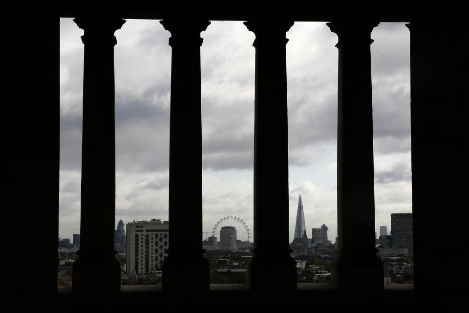 The London Eye and the Shard skyscraper are seen in central London. (Credit: Stefan Wermuth/Reuters)