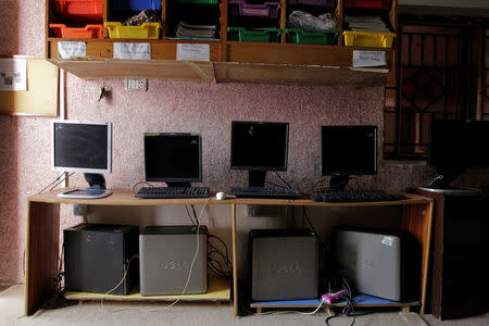 Computers are lined up in the computer lab at the Mashal Model school in Islamabad, Pakistan, September 29, 2017. REUTERS/Caren Firouz