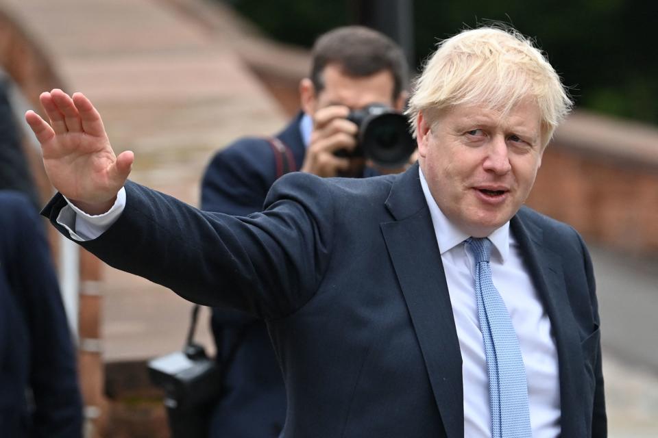 Britain's Prime Minister Boris Johnson is seen on the third day of the annual Conservative Party Conference being held at the Manchester Central convention centre in Manchester, northwest England, on October 5, 2021. (Photo by Paul ELLIS / AFP) (Photo by PAUL ELLIS/AFP via Getty Images)