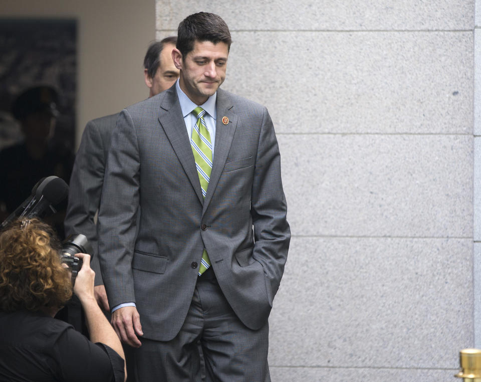 House Budget Committee chairman Rep. Paul Ryan, R-Wis., walks to a meeting with House Republicans on Capitol Hill on Wednesday, Oct. 16, 2013 in Washington. (AP Photo/ Evan Vucci)