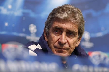 Manchester City's manager Manuel Pellegrini listens to a question during a news conference at the Etihad Stadium in Manchester, northern England November 24, 2014. REUTERS/Phil Noble