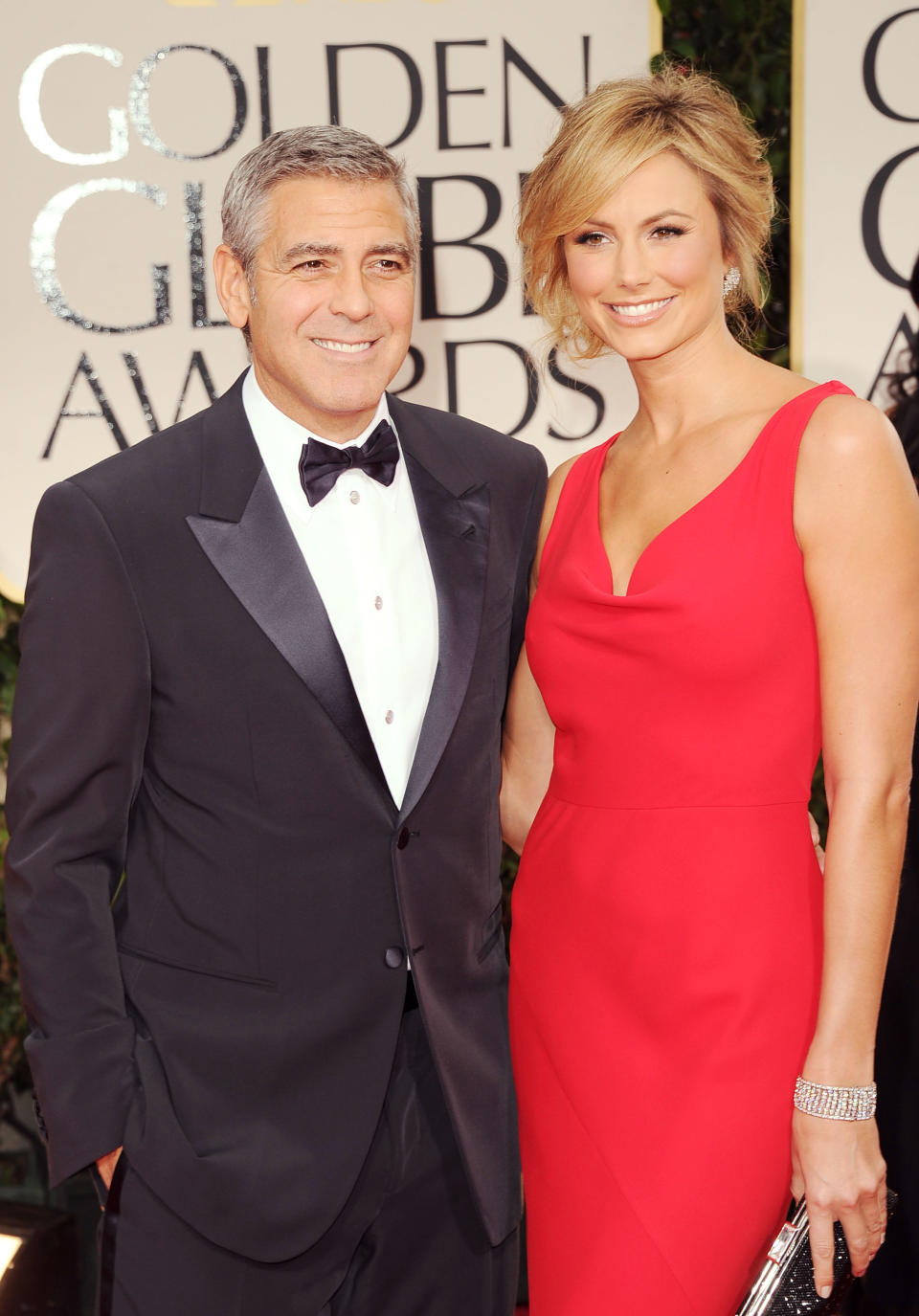 BEVERLY HILLS, CA - JANUARY 15: Actors George Clooney and Stacy Keibler arrives at the 69th Annual Golden Globe Awards held at the Beverly Hilton Hotel on January 15, 2012 in Beverly Hills, California. (Photo by Jason Merritt/Getty Images)