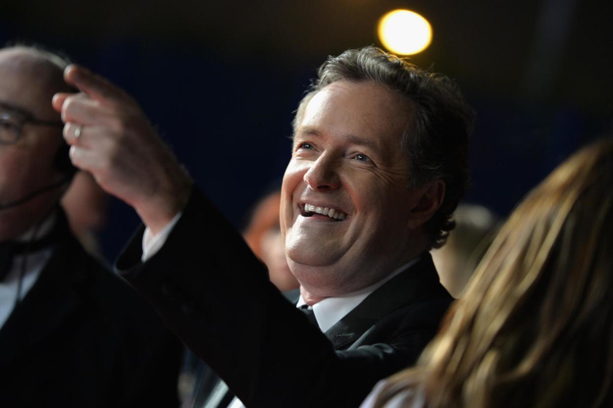 File Photo: TV presenter Piers Morgan points and laughs during the National Television Awards in January: Getty/Jeff Spicer