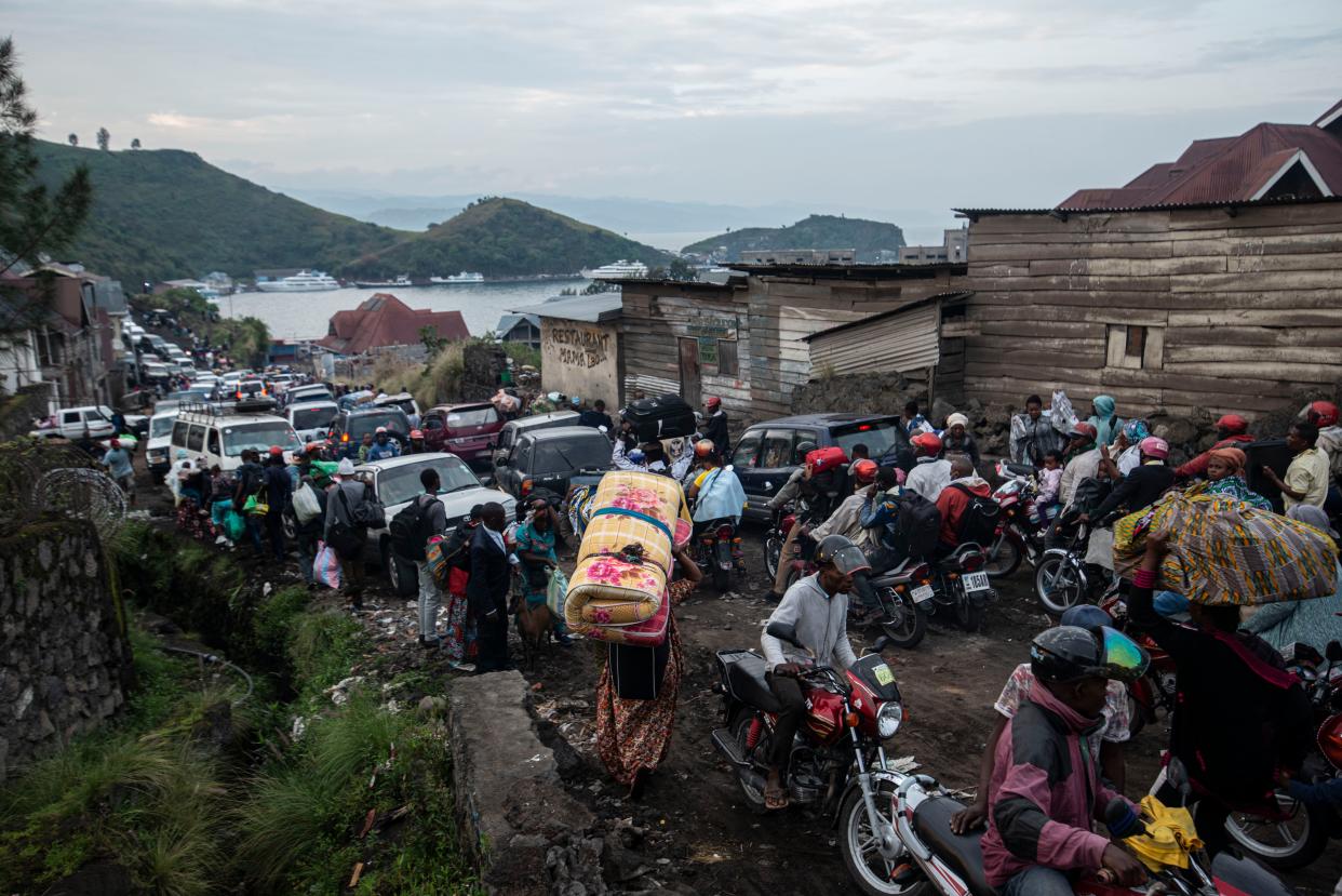 Residents flee Goma, Congo on Thursday after the volcano Mount Nyiragongo erupted  (AP)