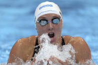 Katinka Hosszu of Hungary swims in a heat during the women's 200-meter individual medley at the 2020 Summer Olympics, Monday, July 26, 2021, in Tokyo, Japan. (AP Photo/Matthias Schrader)