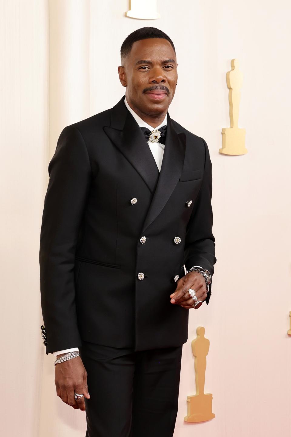 Image may contain: Colman Domingo, Blazer, Clothing, Coat, Jacket, Formal Wear, Suit, Adult, Person, Standing, and Tuxedo