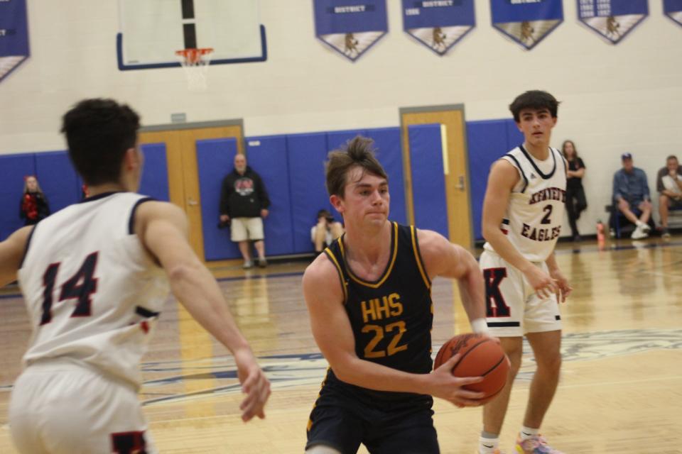 Hillsdale's Braylen Jarvis attacks the paint versus John F. Kennedy Catholic.