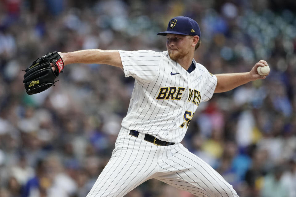 Milwaukee Brewers' Eric Lauer pitches during the first inning of the team's baseball game against the Cincinnati Reds on Friday, Aug. 5, 2022, in Milwaukee. (AP Photo/Aaron Gash)