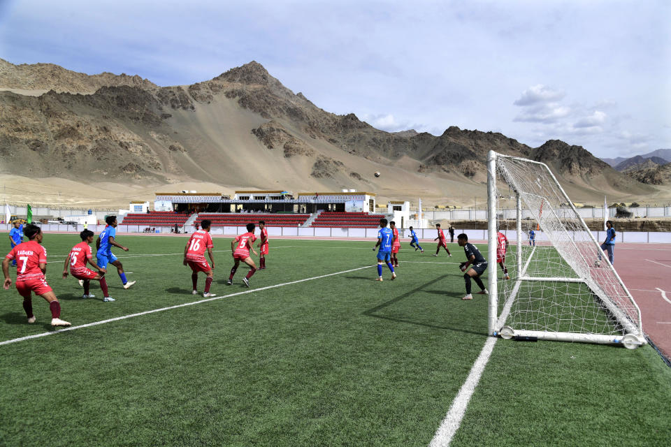 Players participate in “climate cup” a first of its kind “climate-friendly” soccer tournament on the outskirts of Leh, Ladakh, India, Tuesday, Sept.5, 2023. The organizers say the matches are first in Asia to be held at an altitude of 11,000 feet, about 3,350 meters, and with a minimum carbon footprint. Ladakh is an ecologically fragile territory where oxygen is thin, and breathing is hard. (AP Photo/Stanzin Khakyab)