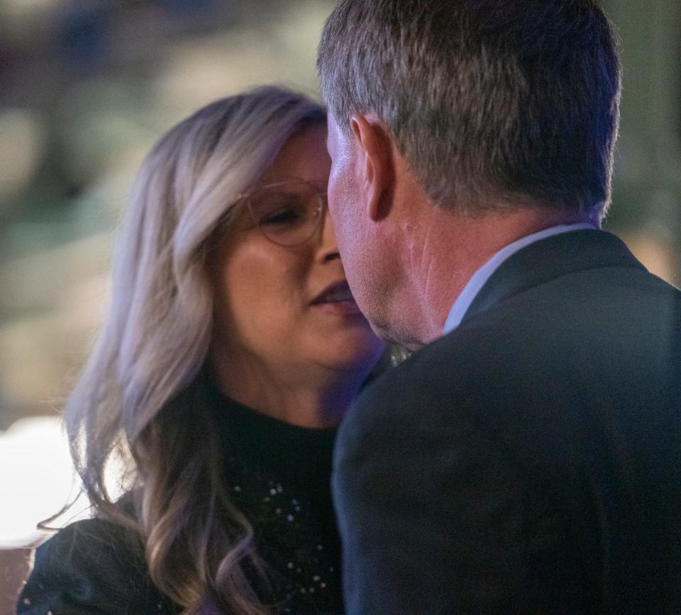 Joe Hogsett gets a kiss from his wife Stephanie Hogsett at City Market on Tuesday, Nov. 15, 2022, after the announcement by incumbent mayor Hogsett that he is seeking another term as Indianapolis mayor. 