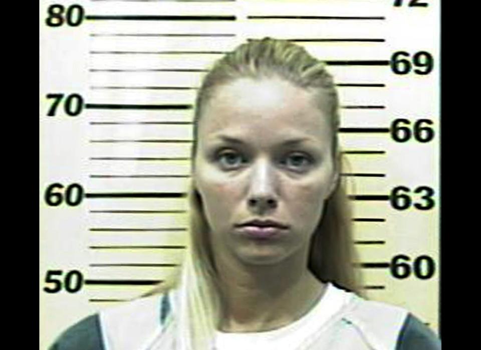 This April 26, 2006 booking mug shot shows Pamela Rogers Turner after her arrest. Turner, now 34, a former teacher who served time in jail for having sex with a 13-year-old boy, is currently serving a prison sentence for sending inappropriate photos and videos of herself to that same boy after she served out her original sentence. (AP Photo/Warren County Sheriff, HO)