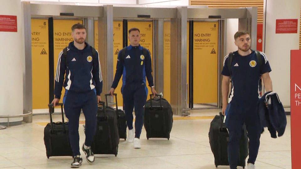 Anthony Ralston, Lawrence Shankland and James Forrest arrive at Glasgow Airport